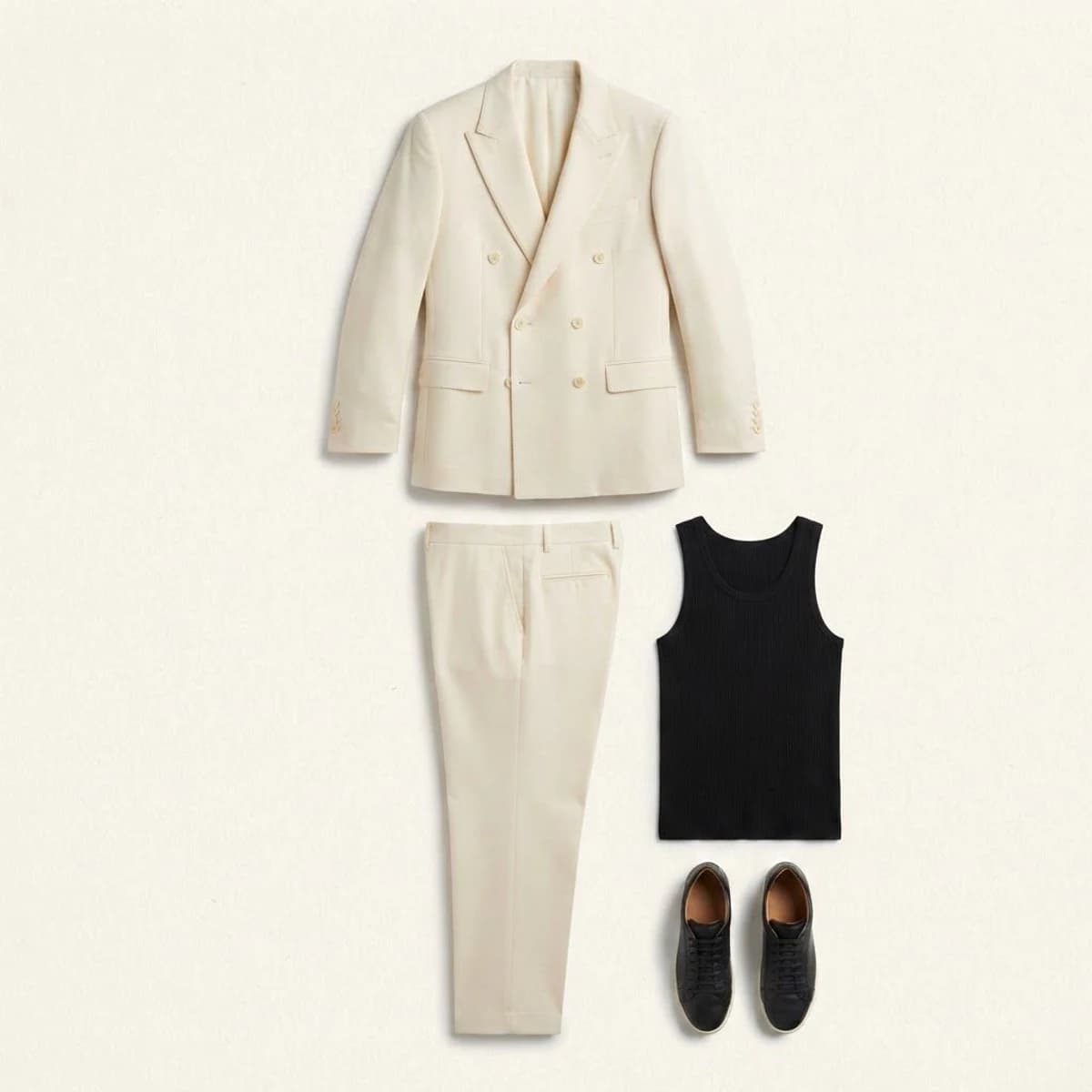 Cream suit and loafers arranged as a complete outfit board reference