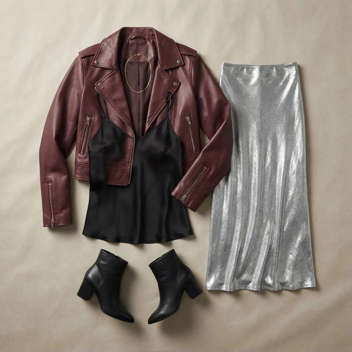 Leather night-out layers arranged as a complete outfit board reference