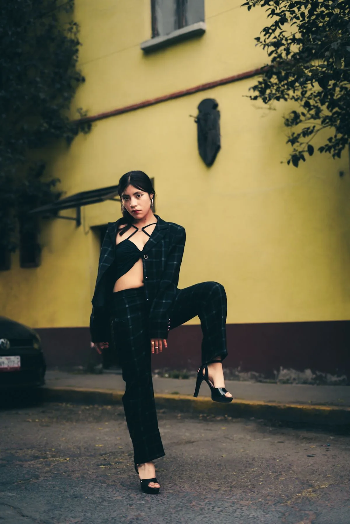 Black cutout top with tailored trousers and heels